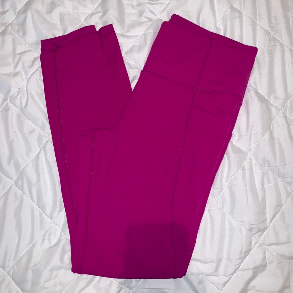 Athleta Stash Pocket Salutation Tight